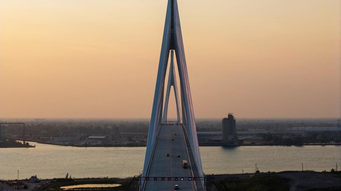 Vehicles cross the $4.7 billion Gordie Howe International Bridge, connecting Windsor, Ontario and Detroit, Michigan, on its opening day in Windsor, Ontario, Canada, July 27, 2026. Picture taken with mobile phone. REUTERS/Carlos Osorio