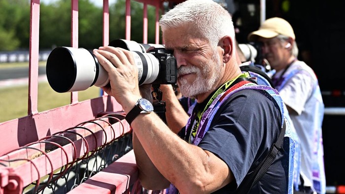 Formula One F1 - Hungarian Grand Prix - Hungaroring, Budapest, Hungary - July 26, 2026 Czech Republic president Petr Pavel takes a photograph during the race REUTERS/Marton Monus