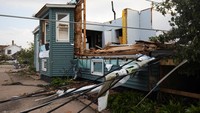 National Weather Service (NWS) mengonfirmasi tornado tersebut terbentuk dari sistem badai kuat yang dipicu suhu panas dan kelembapan tinggi di kawasan Great Lakes. REUTERS/Daniel Kramer