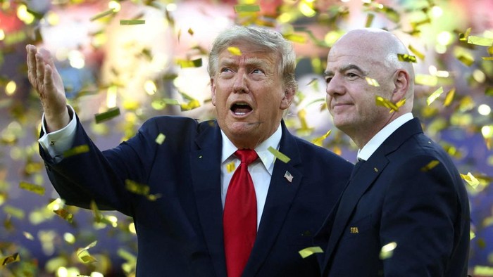 Soccer Football - FIFA World Cup 2026 - Final - Spain v Argentina - New York/New Jersey Stadium, East Rutherford, New Jersey, U.S. - July 19, 2026 U.S. President Donald Trump and FIFA President Gianni Infantino during the trophy presentation after the match IMAGN IMAGES via Reuters/Mark J Rebilas     TPX IMAGES OF THE DAY
