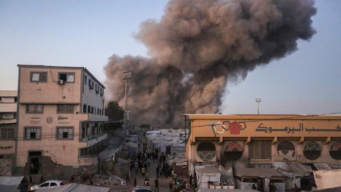 GAZA CITY, GAZA - JULY 28: Smoke from an explosion can be seen after an Israeli attack on July 28, 2026 in Gaza City, Gaza. According to witnesses, one person was injured and homes damaged when an Israeli strike reportedly targeted the Al-Muttaqin Mo