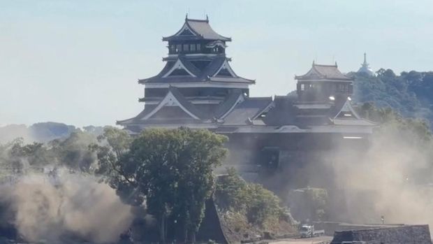 Dust rises near Kumamoto Castle, during an earthquake, in Kumamoto city, Kumamoto Prefecture, Japan, July 28, 2026, in this still image taken from a social media video. @ryupro520 via Instagram/via REUTERS  THIS IMAGE HAS BEEN SUPPLIED BY A THIRD PARTY. MANDATORY CREDIT. NO RESALES. NO ARCHIVES.  Verification Lines:  Reuters verified the location of the video by the buildings, trees, road layout and parking lot which matched archive and satellite imagery. The shape of the mountains matched the topography mapping of the area. The video was filmed at the coordinates: 32.809216940148396, 130.7100506962541. The date was verified by official reports on the 7.1-magnitude earthquake and corroborating footage of the Kumamoto Castle that was affected.