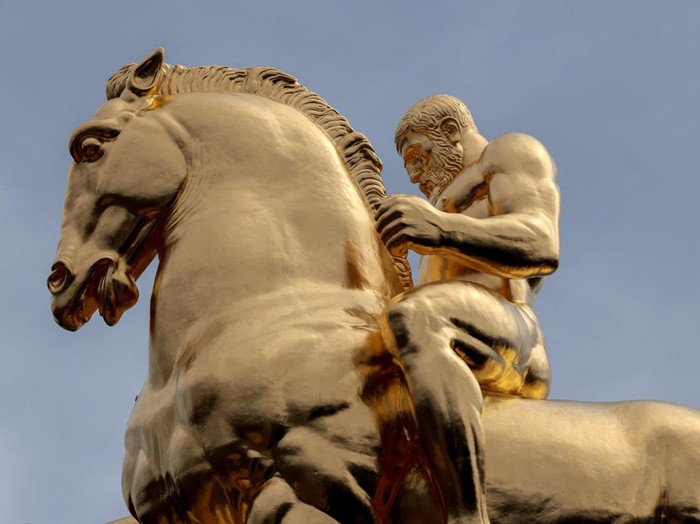 U.S. National Guard troops stand near the statues “Valor” and “Sacrifice”, the “Arts of War