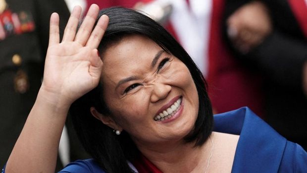 Peru's President Keiko Fujimori waves as she steps out of the Congress after being sworn in as the country's new president, in Lima, Peru, July 28, 2026. REUTERS/Angela Ponce