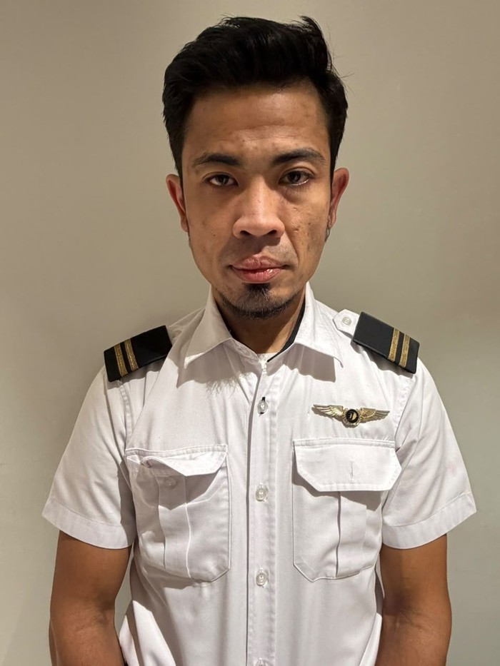 Pilot asing, Mohd Saufi bin Othman ditangkap di Bandara Soekarno-Hatta atas dugaan penyelundupan 26 kilogram ekstasi, Selasa (28/7/2026).