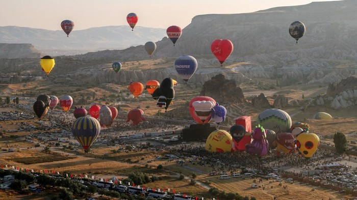 Hot air balloons fly during the 7th International Cappadocia Balloon Festival in Goreme, Nevsehir province, Turkey, August 2, 2026. REUTERS/Cagla Gurdogan