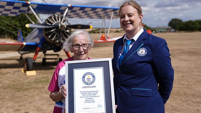 97-year-old Betty Bromage after a successful attempt to break the Guinness World Record for the oldest female wing-walker, with her sixth wing walk, at RFC Rendcomb Airfield near Cirencester, Gloucestershire. Picture date: Tuesday August 4, 2026. (Photo by Andrew Matthews/PA Images via Getty Images)