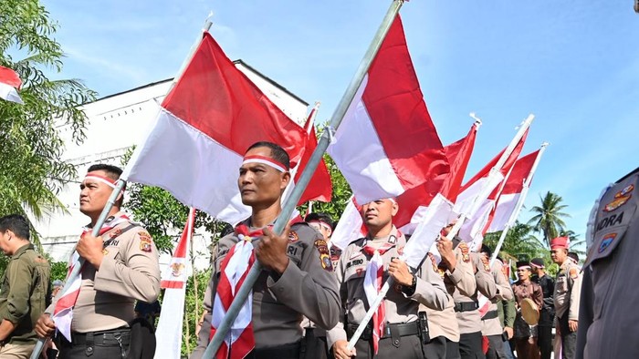 Ekspedisi Merah Putih Presisi Polda Riau hadir di Dumai, membawa bansos, pelayanan kesehatan hingga penanaman mangrove, Jumat (7/8/2026).
