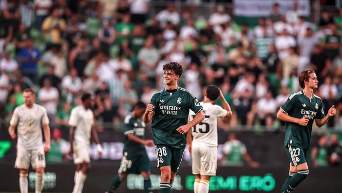 Real Madrid kalahkan Ferencvaros 2-1. 