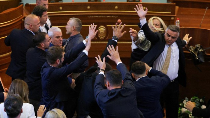 Kosovar lawmaker Time Kadriaj throws an egg at Prime Minister Albin Kurti (not pictured) during a plenary session to elect the new speaker of the parliament, in Pristina, Kosovo, August 8, 2026. Kosovos parliament remains unconstituted. REUTERS/Vald