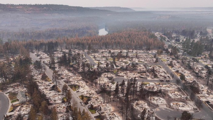 A drone view shows a neighborhood burned by the Old Trails Fire in Spokane, Washington, U.S., August 10, 2026.  REUTERS/David Ryder