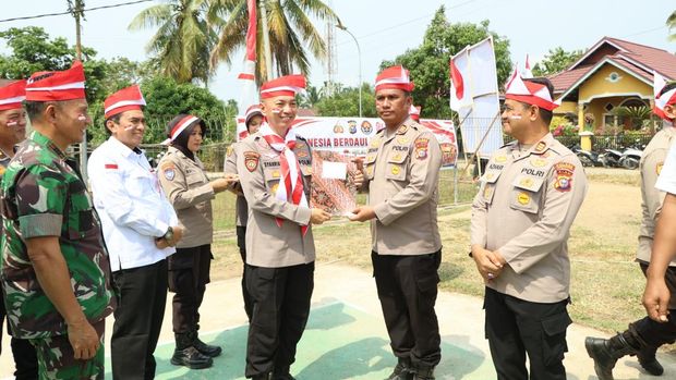 Ekspedisi Merah Putih Presisi Polda Riau menjangkau warga di pesisir Sungai Kuantan, Kecamatan Cerenti, Kabupaten Kuansing, Rabu (12/8/2026).