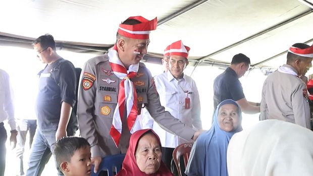 Ekspedisi Merah Putih Presisi Polda Riau menjangkau warga di pesisir Sungai Kuantan, Kecamatan Cerenti, Kabupaten Kuansing, Rabu (12/8/2026).