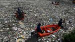 Hujan Lebat Guyur Metro Manila, Sampah Terbawa Arus Penuhi Sungai