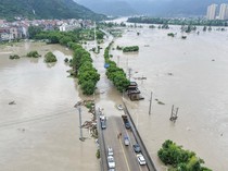 Jejak Topan Lumba-lumba, Banjir Rendam Kota Pesisir Yuhuan China