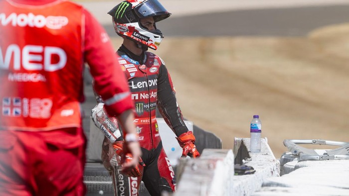 NORTHAMPTON, ENGLAND - AUGUST 09: Francesco Bagnaia of Italy and Ducati Lenovo Team  with medical staff after crashed out during the MotoGP race during the MotoGP Of Great Britain - Race at Silverstone Circuit on August 09, 2026 in Northampton, Engla
