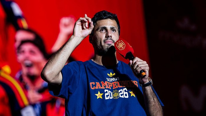 MADRID, SPAIN - JULY 20: Rodri of Spain celebrate on stage during the FIFA World Cup 2026 parade on July 20, 2026 in Madrid, Spain. The final match of the FIFA World Cup 2026 was held at New York New Jersey Stadium in New Jersey between Spain and Argentina. (Photo by Luciano Lima/Getty Images)