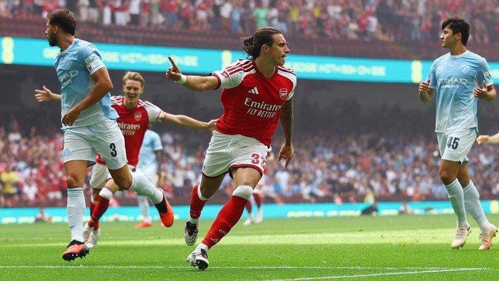Soccer Football - FA Community Shield - Arsenal v Manchester City - Principality Stadium, Cardiff, Wales, Britain - August 16, 2026 Arsenals Riccardo Calafiori celebrates scoring their first goal Action Images via Reuters/Matthew Childs