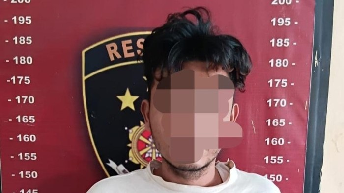 Pelaku RF usai diamankan petugas kepolisian.
