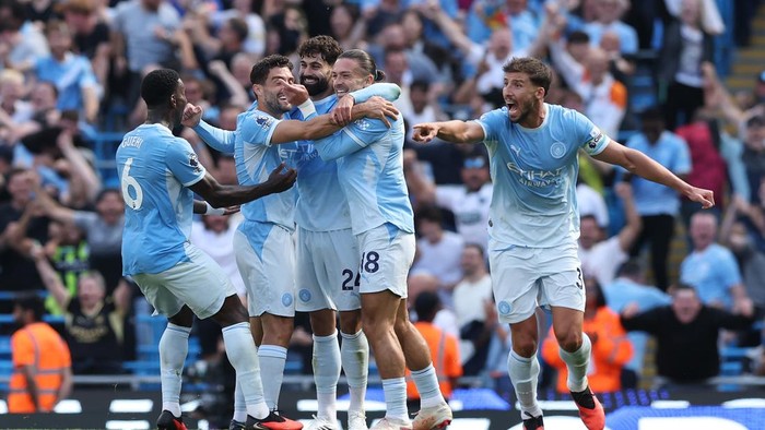 MANCHESTER, ENGLAND - AUGUST 23: Josko Gvardiol of Manchester City celebrates scoring his teams second goal with Rayan Cherki, Jack Grealish and Ruben Dias during the Premier League 2026/27 match between Manchester City and AFC Bournemouth at Etihad Stadium on August 23, 2026 in Manchester, England. (Photo by Michael Steele/Getty Images)