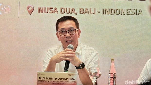 Budi Satria Dharma Purba , Director of Wholesale & International Service Telkom Indonesia