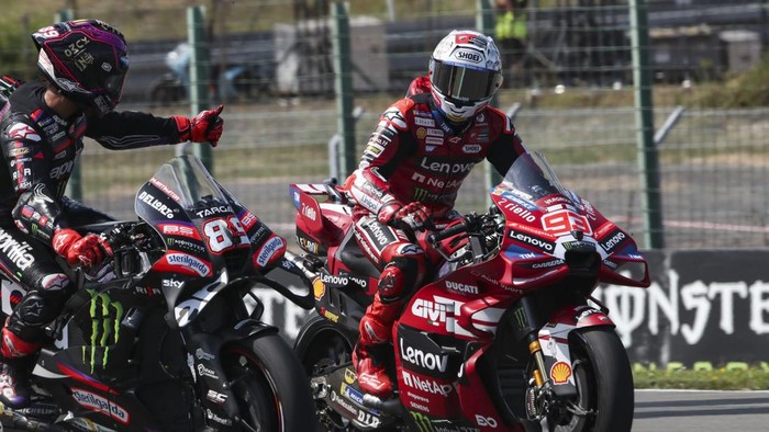 BRNO, CZECH REPUBLIC - JUNE 20: Jorge Martin of Spain riding the Aprilia Racing bike (89) congratulates Marc Marquez of Spain riding the Lenovo Ducati (93) on finishing third during the Tissot Sprint ahead of the MotoGP of  Czechia at Brno Circuit on