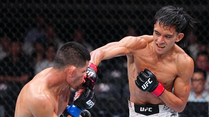 SHANGHAI, CHINA - AUGUST 29: Bilal Hasan knocks out Nilson Rojas of Peru in a flyweight fight during the UFC Fight Night event at SPD Bank Oriental Sports Center on August 29, 2026 in Shanghai, China.  (Photo by Chris Unger/Zuffa LLC)
