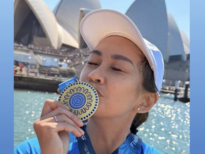 Artis finish di Sydney Marathon 2026.