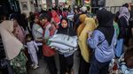 5.600 KK di Pulo Gebang Terima Bantuan 30 Kg Beras