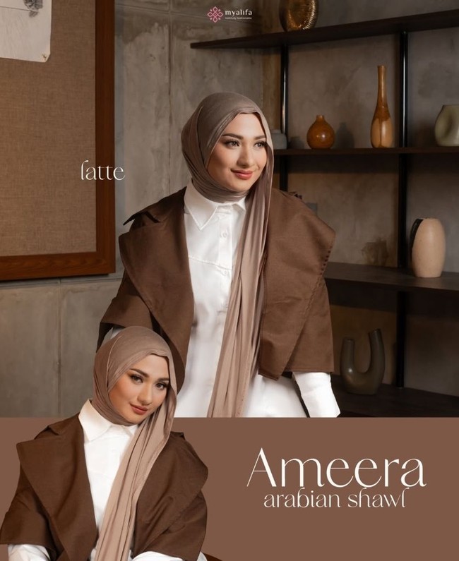 Gaya earth-tone yang memesona dihadirkan Nadzira Shafa melalui perpaduan kemeja putih berlapis outerwear cokelat tua dan pasmina bernuansa senada. Gaya lilitan pashmina menjuntai ini memberikan nuansa modern dan elegan. Foto: Dok. Instagram @enazirashf_.