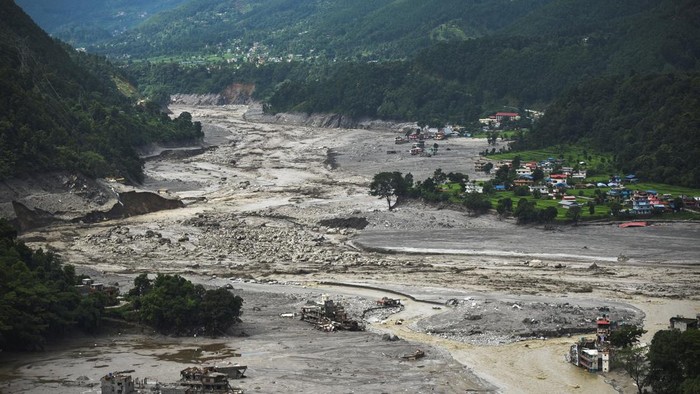 Damaged buildings near Trishuli River following deadly flash floods and a mudslide, in Betrawati Bazaar in Rasuwa district, Nepal, August 30, 2026. REUTERS/Stringer