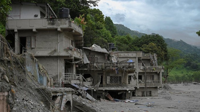 Damaged buildings near Trishuli River following deadly flash floods and a mudslide, in Betrawati Bazaar in Rasuwa district, Nepal, August 30, 2026. REUTERS/Stringer
