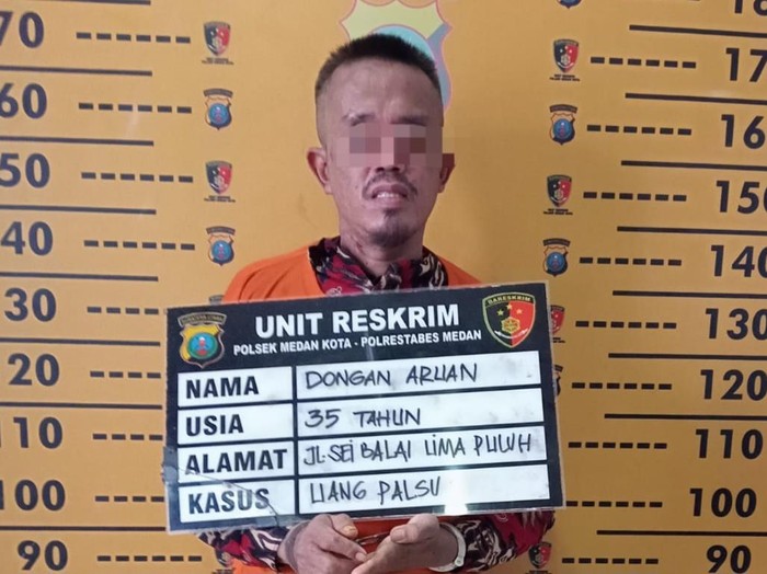 Dongan Aruan (35) ditangkap karena mengedarkan uang palsu di Medan