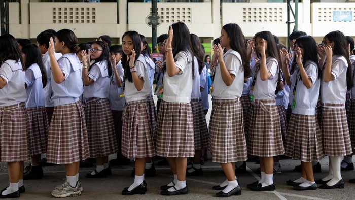 Students take cover during an active-shooter drill following recent school shootings in the country, at Carlos F. Gonzales High School in San Rafael, Bulacan, Philippines, September 3, 2026. REUTERS/Eloisa Lopez