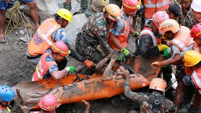 Survivor Sanjay Sah is carried by members of a search and rescue team after they rescued alive two people who had been trapped inside a tunnel at the Upper Trishuli-3A Hydropower Project following devastating floods and mudslides that struck the Bhotekoshi River in Rasuwa, Nepal, September 4, 2026. Nepal Army/Handout via REUTERS. THIS IMAGE HAS BEEN SUPPLIED BY A THIRD PARTY. MANDATORY CREDIT. NO RESALES. NO ARCHIVES.  REFILE - ADDING THE NAME OF THE SURVIVOR