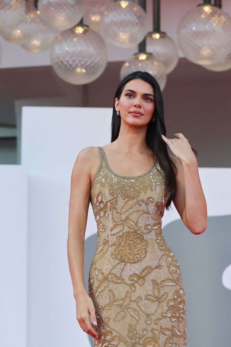Kendall Jenner poses on the red carpet during arrivals for the screening of the movie 