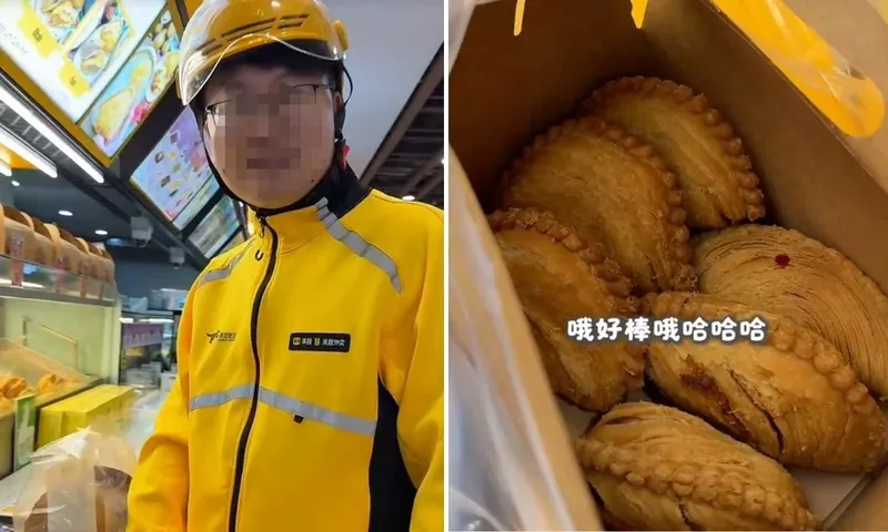 Kurir pengantar makanan ambil pesanan di Singapura