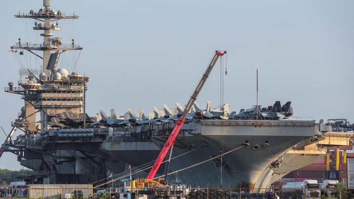 Aircraft on the deck of the U.S. Navy Nimitz-class aircraft carrier USS Abraham Lincoln as it docks at Laem Chabang Port for a rest stop following a long deployment in the Middle East, in Chonburi province, Thailand, September 3, 2026. REUTERS/Chalin