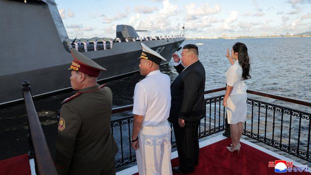 NORTHKOREA-WARSHIP/ North Korean leader Kim Jong Un, accompanied by his daughter Kim Ju Ae, attends the commissioning ceremony of the destroyer