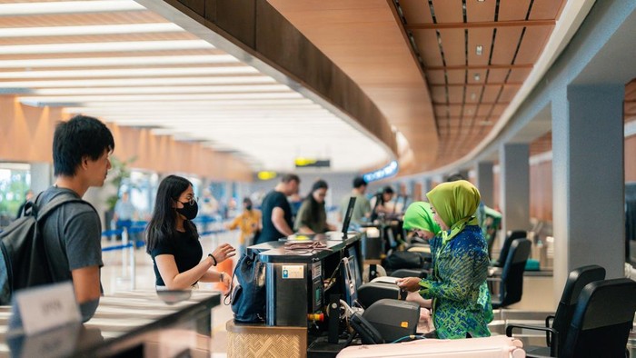 Ilustrasi check-in Bandara