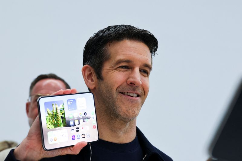 New Apple CEO John Ternus holds the new foldable iPhone Duo during Apple's event at the Steve Jobs Theater in Cupertino, California, U.S. September 9, 2026. REUTERS/Carlos Barria