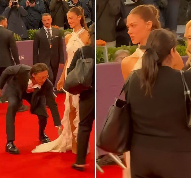 Brooklyn yang mengenakan setelan jas hitam tak ragu untuk membetulkan ekor dari dress Nicola agar tidak menghalangi langkah mereka dan terlihat bagus di kamera. Foto: Twitter