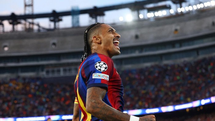 Soccer Football - UEFA Champions League - FC Barcelona v Feyenoord - Spotify Camp Nou, Barcelona, Spain - September 9, 2026 FC Barcelonas Raphinha celebrates scoring their third goal REUTERS/Albert Gea