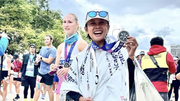 Krisna Kartika saat finish di Chicago Marathon Krisna Kartika saat finish di Chicago Marathon