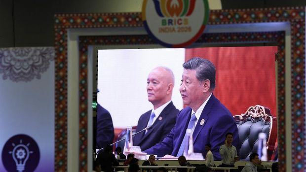 A screen displayed at the international media centre shows Chinese President Xi Jinping attending the BRICS Summit at Bharat Mandapam in New Delhi, India, September 13, 2026. REUTERS/Bhawika Chhabra