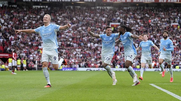Manchester Citys Erling Haaland (left) celebrates after scoring his sides first goal during the Premier League match at Old Trafford, Manchester. Picture date: Sunday September 13, 2026. (Photo by Peter Byrne/PA Images via Getty Images)
