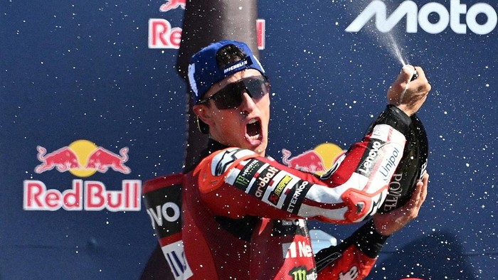 MotoGP - San Marino Grand Prix - Misano World Circuit Marco Simoncelli, Misano, Italy - September 13, 2026 Ducati Lenovo Teams Marc Marquez celebrates with champagne on the podium after winning the MotoGP race REUTERS/Jennifer Lorenzini     TPX IMAG