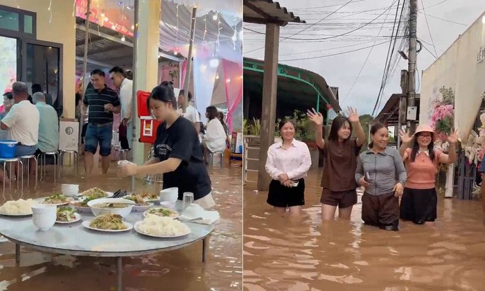 Pesta pernikahan di Vietnam, viral usai diterjang banjir. Para tamu tetap ceria santap hidangan berdiri di tengah genangan air setinggi lutut.