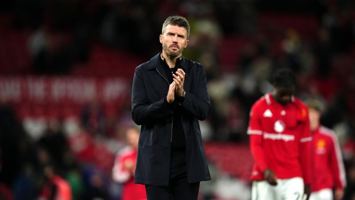 Manchester United manager Michael Carrick applauds the fans following the Carabao Cup Third Round match at Old Trafford, Manchester. Picture date: Wednesday September 16, 2026. (Photo by Martin Rickett/PA Images via Getty Images)