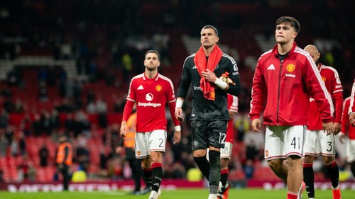 MANCHESTER, ENGLAND - SEPTEMBER 16: Karl Darlow of Manchester United applauds the fans after the Carabao Cup Third Round match between Manchester United and Brighton & Hove Albion at Old Trafford on September 16, 2026 in Manchester, England. (Photo by Ash Donelon/Manchester United via Getty Images)